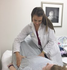 Dr. Casey with patient room 1